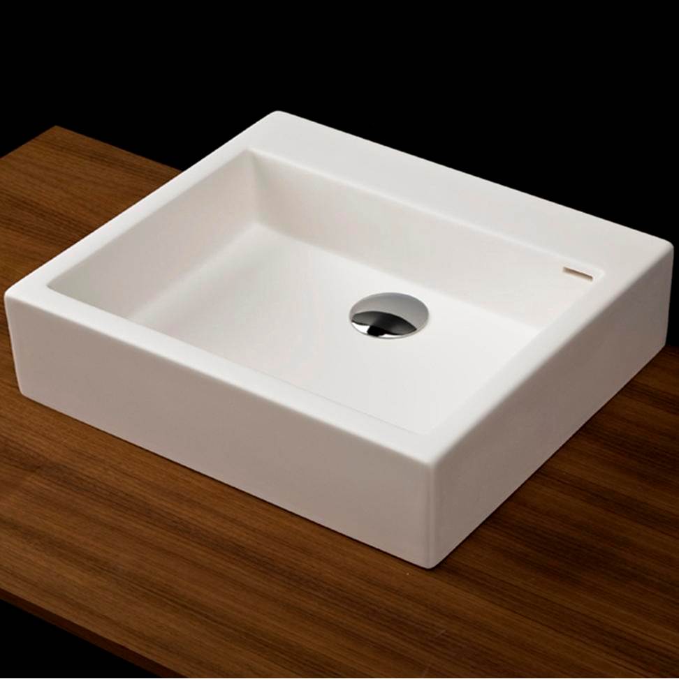 Lacava Vessel Bathroom Sink made of solid surface, with an overflow.